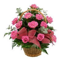 Send New Born flowers in India that includes Pink Roses Basket of 12 Flowers in India