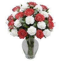 Deliver Red Rose White Carnation Vase 18 Rakhi Flowers in India
