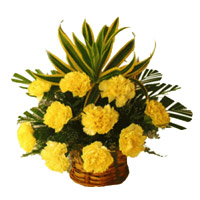 place Order for Yellow Carnation Basket of 12 Rakhi Flowers in India Online