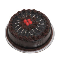 Send Rakhi with 1 Kg Eggless Chocolate Cake to India