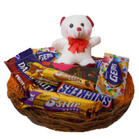 Best Chocolates for Her Delivery in India. Basket of Exotic Chocolates to India and 6 Inch Teddy