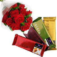 Rakhi Gift Delivery to India Online to Deliver 4 Cadbury Temptation Bars with 12 Red Roses Bunch