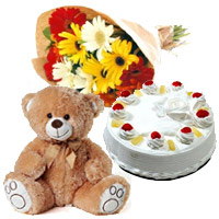 12 Gerbera Bouquet, 1 Kg Pineapple Cake and 1 Teddy Bear, Gifts Deliver to India