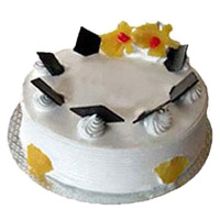 Best Rakhi with Cake Delivery in India with 1 Kg Eggless Pineapple Cake From 5 Star Bakery