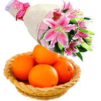 Fresh Fruits Baskets India, Online Gift of Pink Lily Bouquet 3 Stems with 12 pcs Fresh Orange on Rakhi