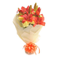 Deliver Diwali Flowers in Chennai. 2 Orange Lily 12 Yellow Carnation Flower Bouquet in India