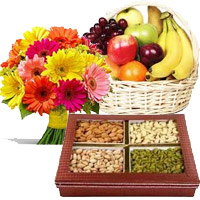 Gifts to Manipal. Online Delivery of 12 Mix Gerberas, 3 Kg Fresh Fruit Basket, 0.5 Kg Mixed Dry Fruits India for Diwali