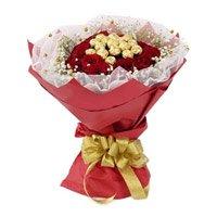 Best Father's Day Chocolates in India. 16 Pcs Ferrero Rocher encircled with 20 Red Roses to India