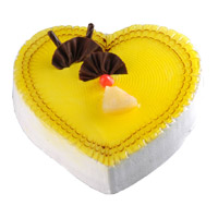 Deliver Online Rakhi to India with 3 Kg Heart Shape Pineapple Cakes in India