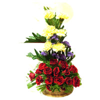 Online Rakhi and FLowers to India. Red Rose Yellow Carnation Basket