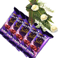 Send 5 Cadbury Silk Bubbly Chocolate With 3 White Roses to India, Newborn Gifts to India