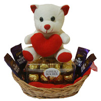 Gifts to India. 4 Dairy Milk 16 Ferrero Rocher Chocolates and 6 Inch Teddy Basket
