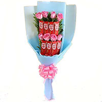 Order for Newborn Gifts in India. 6 Red Roses Flowers to India and 10 Pcs Ferrero Rocher Bouquet
