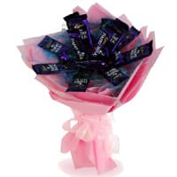 Order Dairy Milk Chocolate Bouquet and 12 Chocolates of Wedding Gifts Delivery in India
