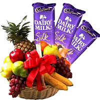 Send 2 Kg Fresh Fruits Basket with 3 Dairy Milk Silk Chocolate to India for Rakhi