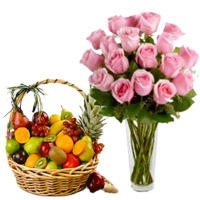 Send Rakhi Gift to India. 12 Pink Roses in Vase with 1 Kg Fresh Fruits Basket in India