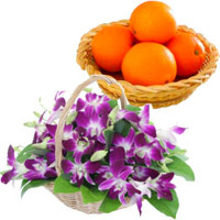 Order for Rakhi Gifts, Purple Orchids Basket 15 Flower Stems with 12 pcs Fresh Orange in India
