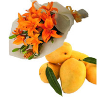 Send Orange Lily Bouquet 4 Flower Stems with 12 pcs Fresh Mango Fruits on Rakhi