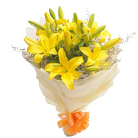 New Year Flowers to India : Celebrate this New Year with yellow lily bouquet flower stems