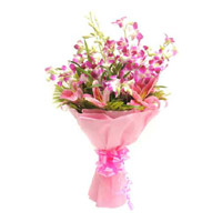 Best Diwali Flowers to Mumbai. Pink Lily Purple Orchid Bouquet 12 Flowers in India