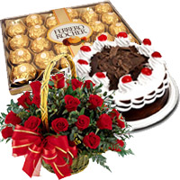 Gifts to India. Send 24 Red Roses Basket with 0.5 Kg Black Forest Cake to India Online with 24 pcs Ferrero Rocher Chocolates in Trivandrum