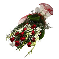 Diwali Flower Delivery in India. Send 6 White Orchids 12 Red Roses Flower Bouquet to India